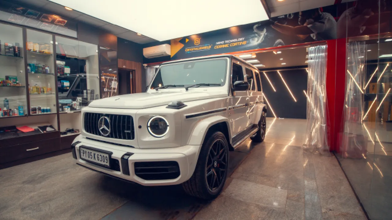 A Mercedes G-Wagon stands inside the PPF bay of a CarzSpa Detailing Studio